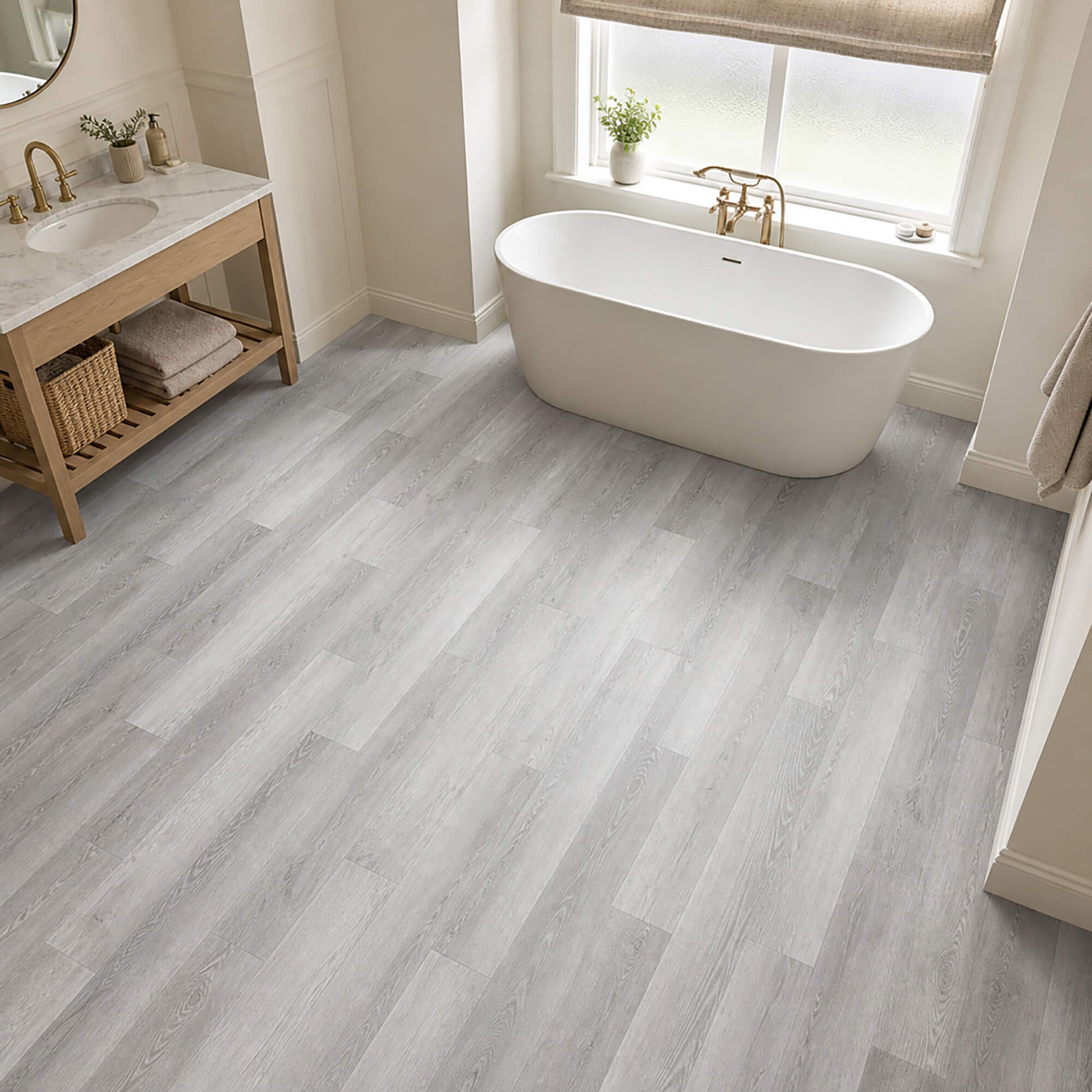 Bamburgh Grey rigid LVT plank flooring in a modern home bathroom setting.