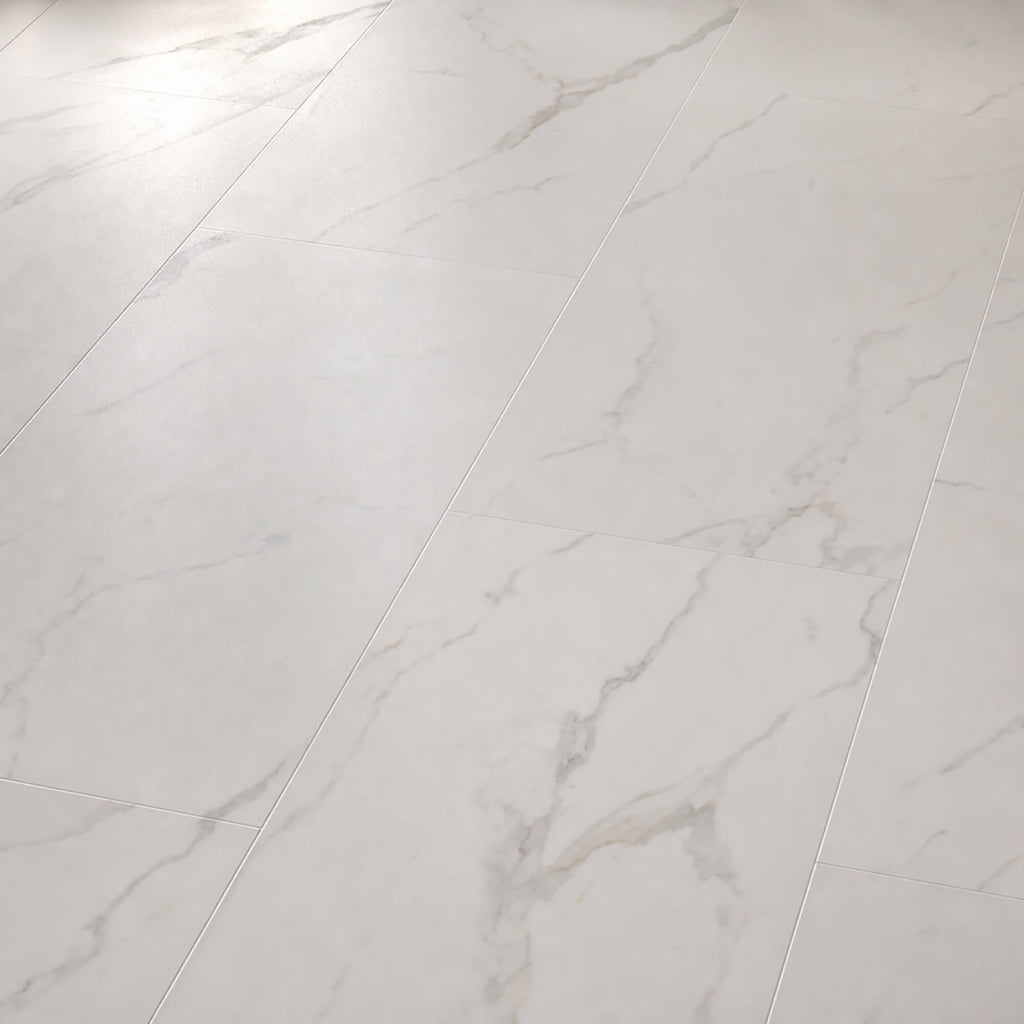 Close-up of Bianco Marble Rigid LVT floor tiles.