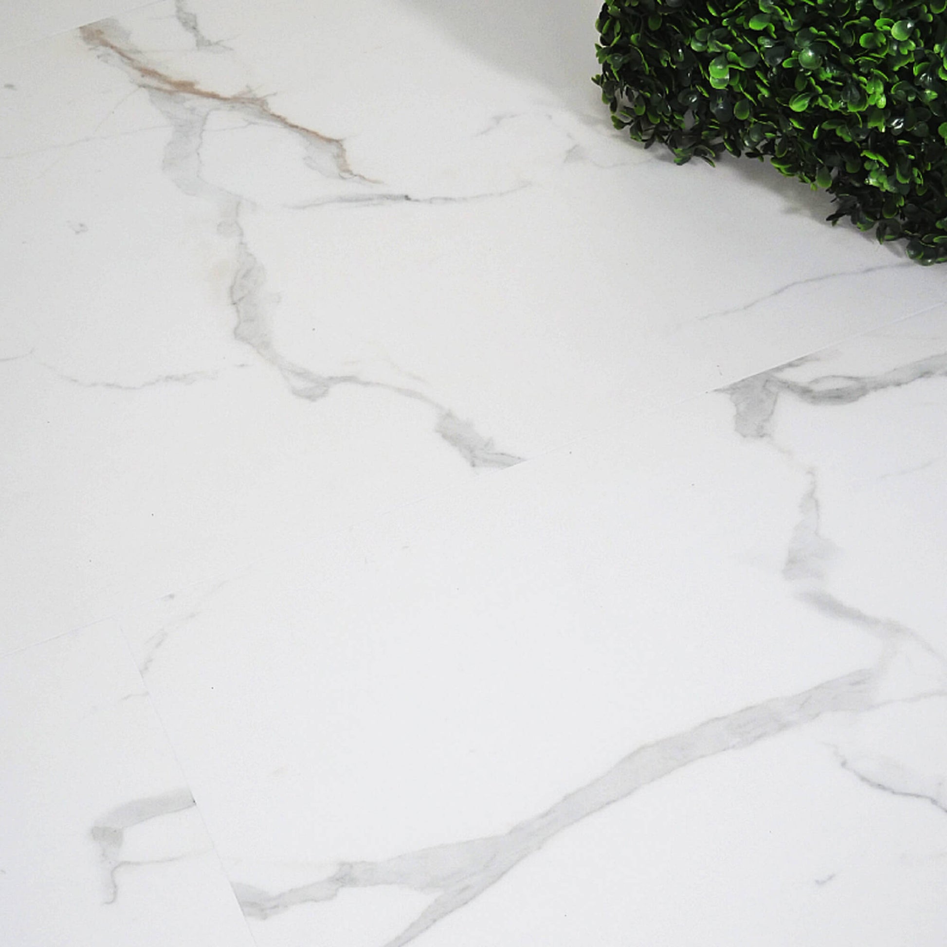 Close-up of Bianco Marble Rigid LVT Floor Tiles