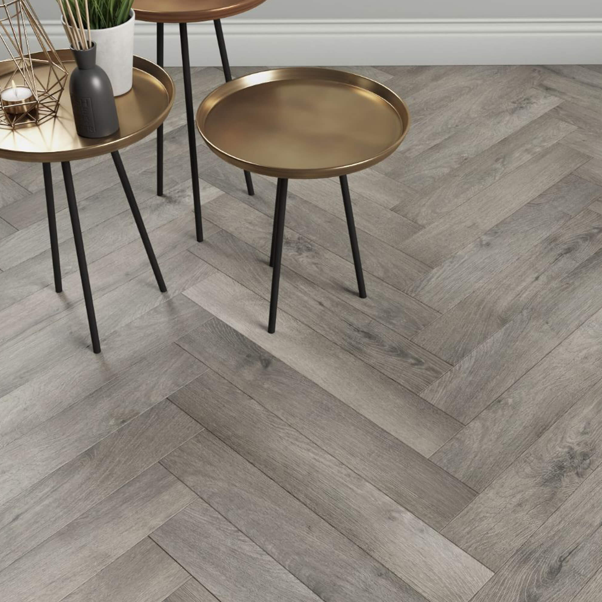 Castle Grey Herringbone Laminate Flooring in a home interior setting.