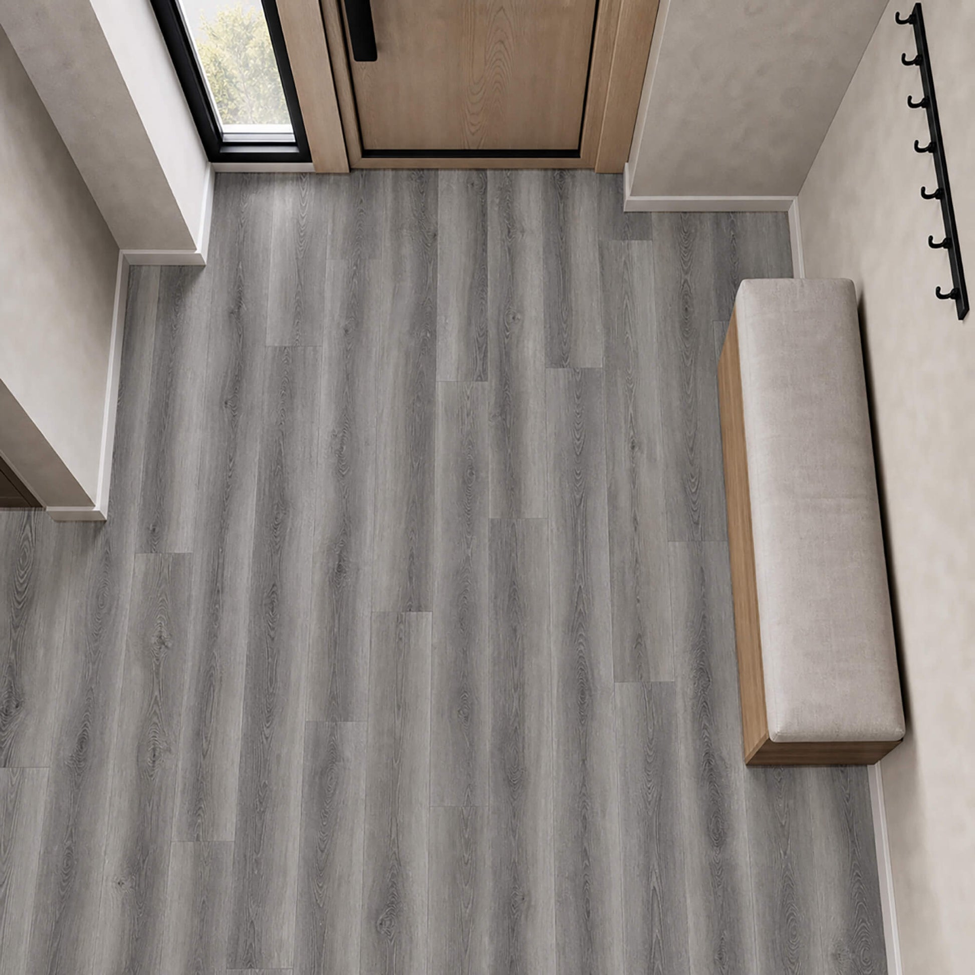 Elevated view of Conwy Grey Rigid LVT plank flooring in a hallway setting.