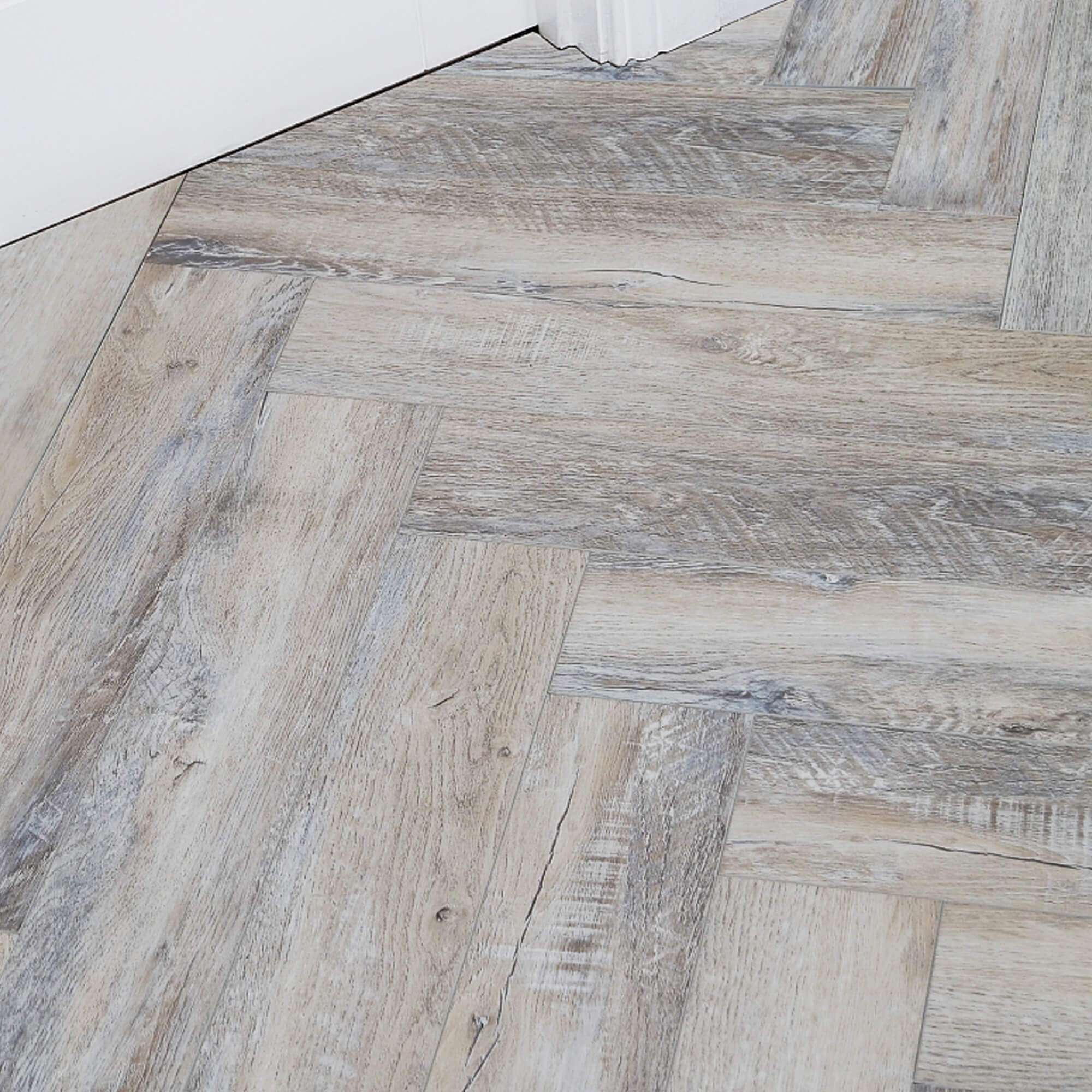 Wooden flooring with a herringbone pattern