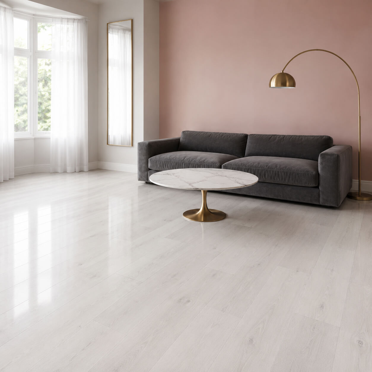 Fresco Pearl Super Gloss Laminate Flooring in a home living room setting with a sofa, table and lamp.