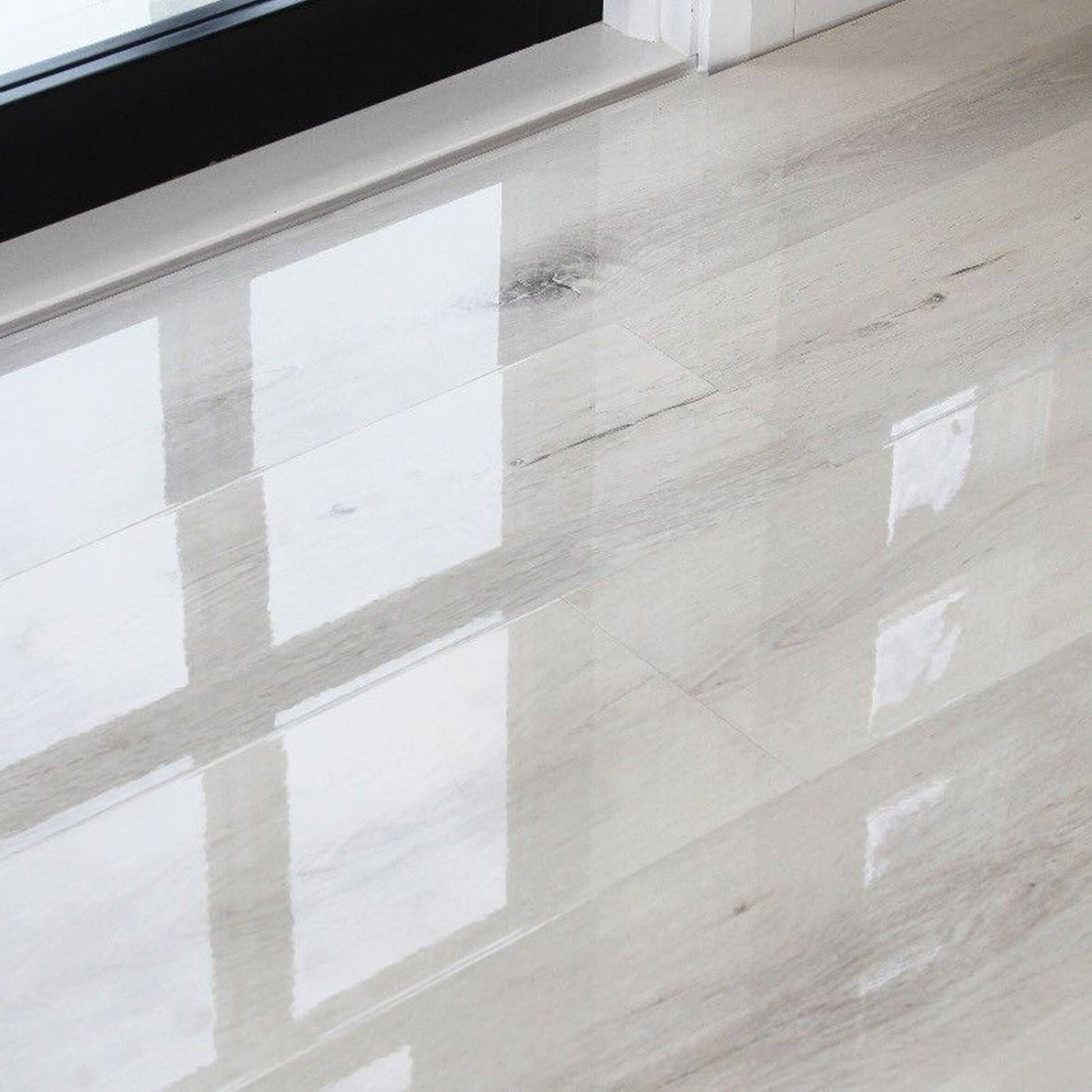 Fresco Pearl Super Gloss Laminate Flooring in a home internal setting.