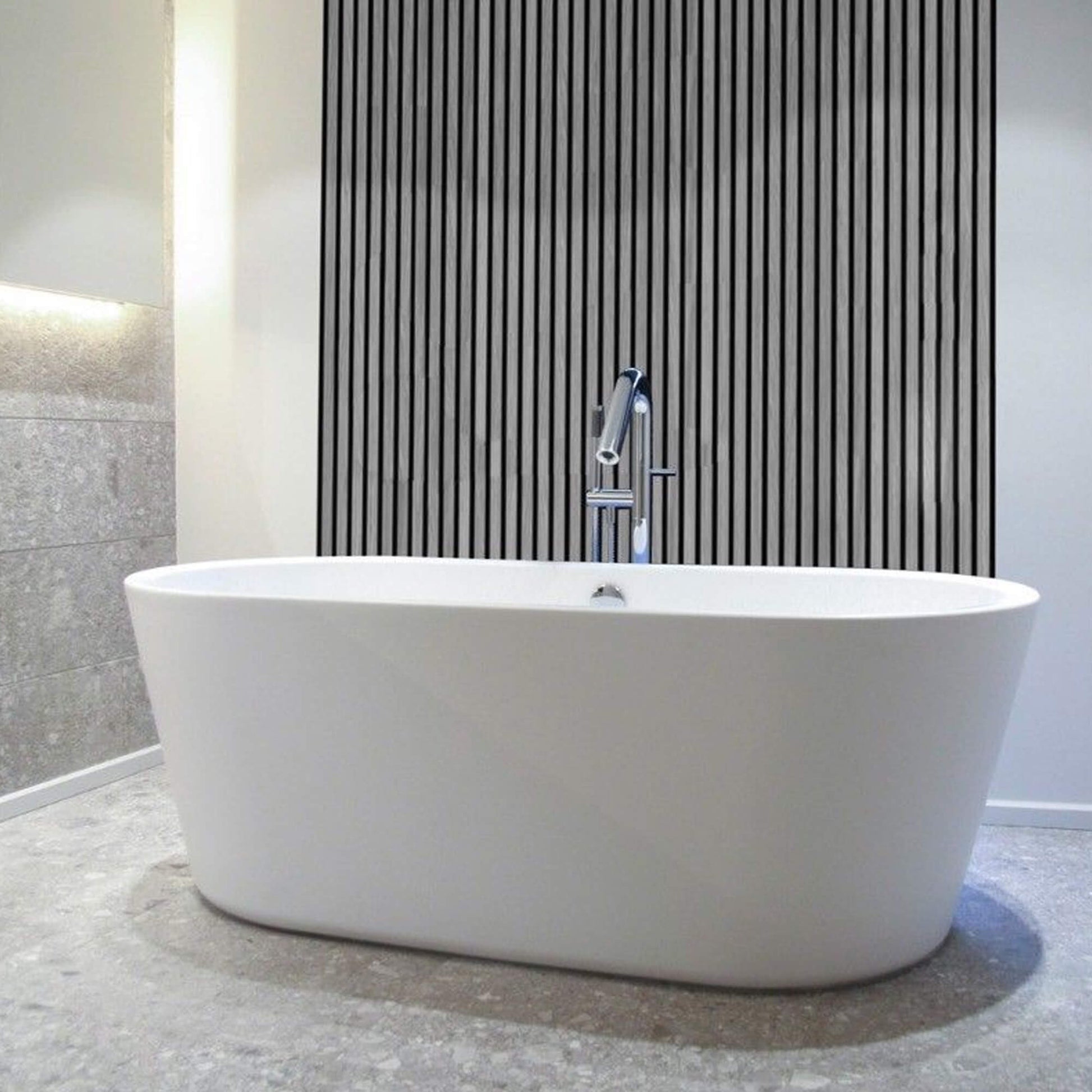 White freestanding bathtub in a modern bathroom with a Grey Aqua Slatwall Panelled feature wall.