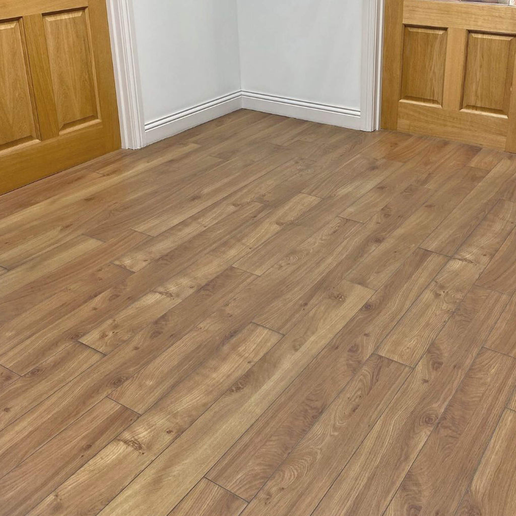 Groovy Oak Prestige Laminate Flooring in a home hallway setting.