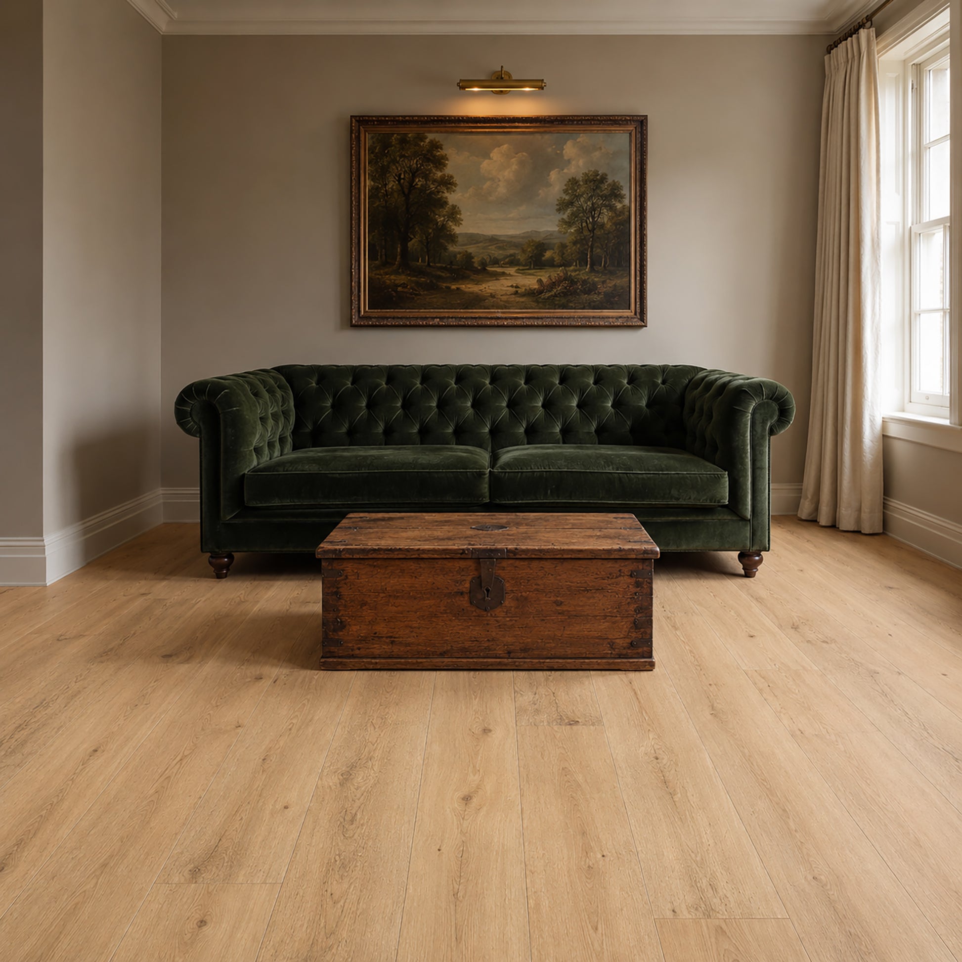 Green velvet sofa in a living room with a Heritage Oak Rigid LVT floor and a painting on the wall.