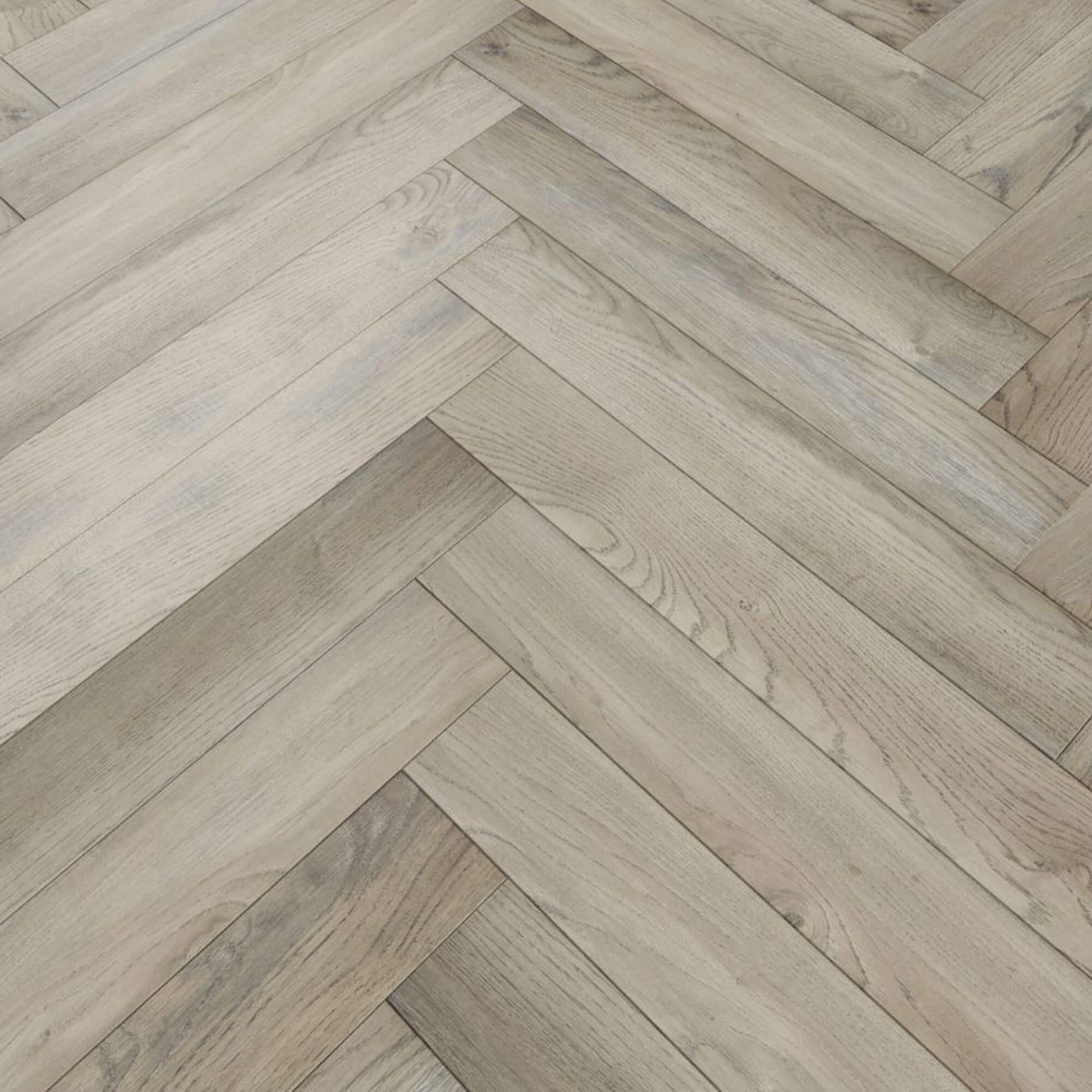 Close-up of Manor Grey Oak Herringbone Laminate Flooring
