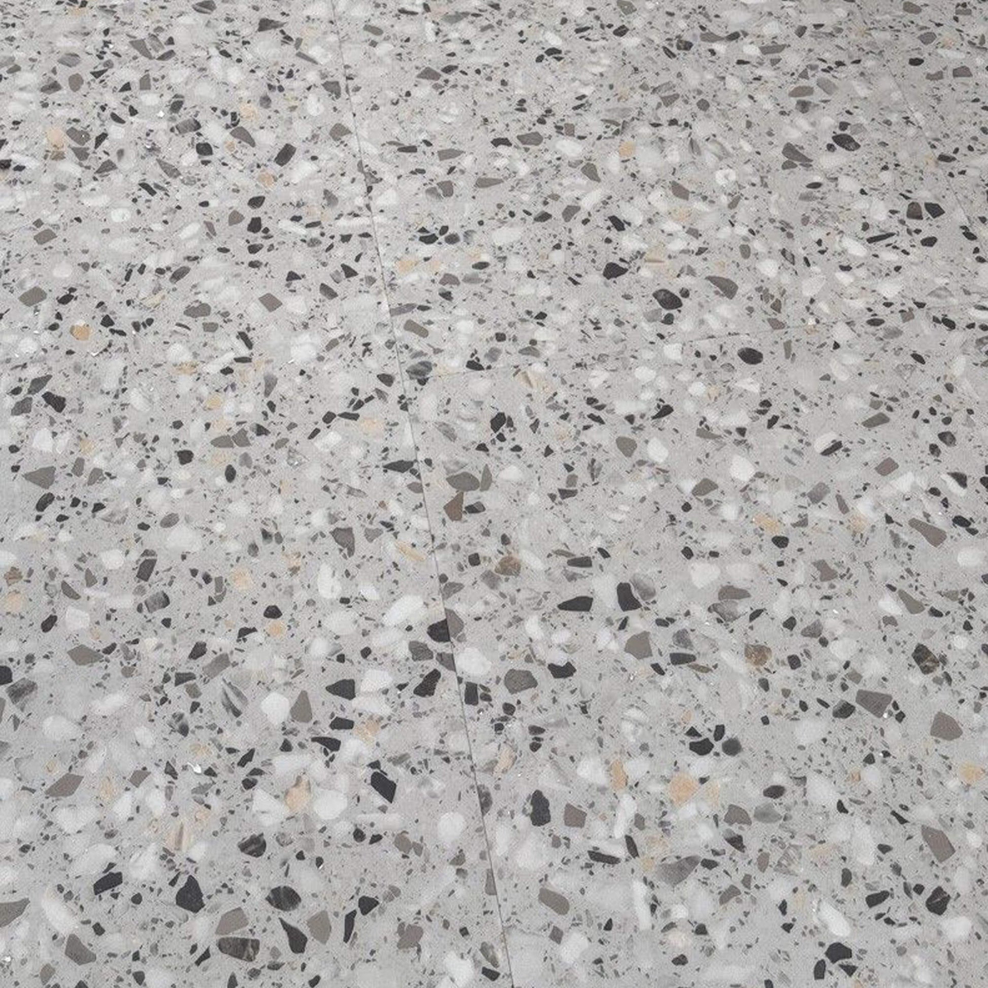 Close-up of Milano Terrazzo Rigid LVT floor tiles on a floor