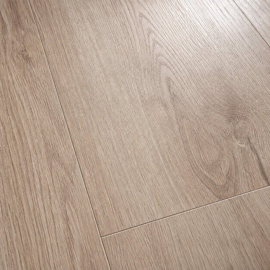 Close-up of the grain and texture of Natural Sterling Oak laminate flooring.