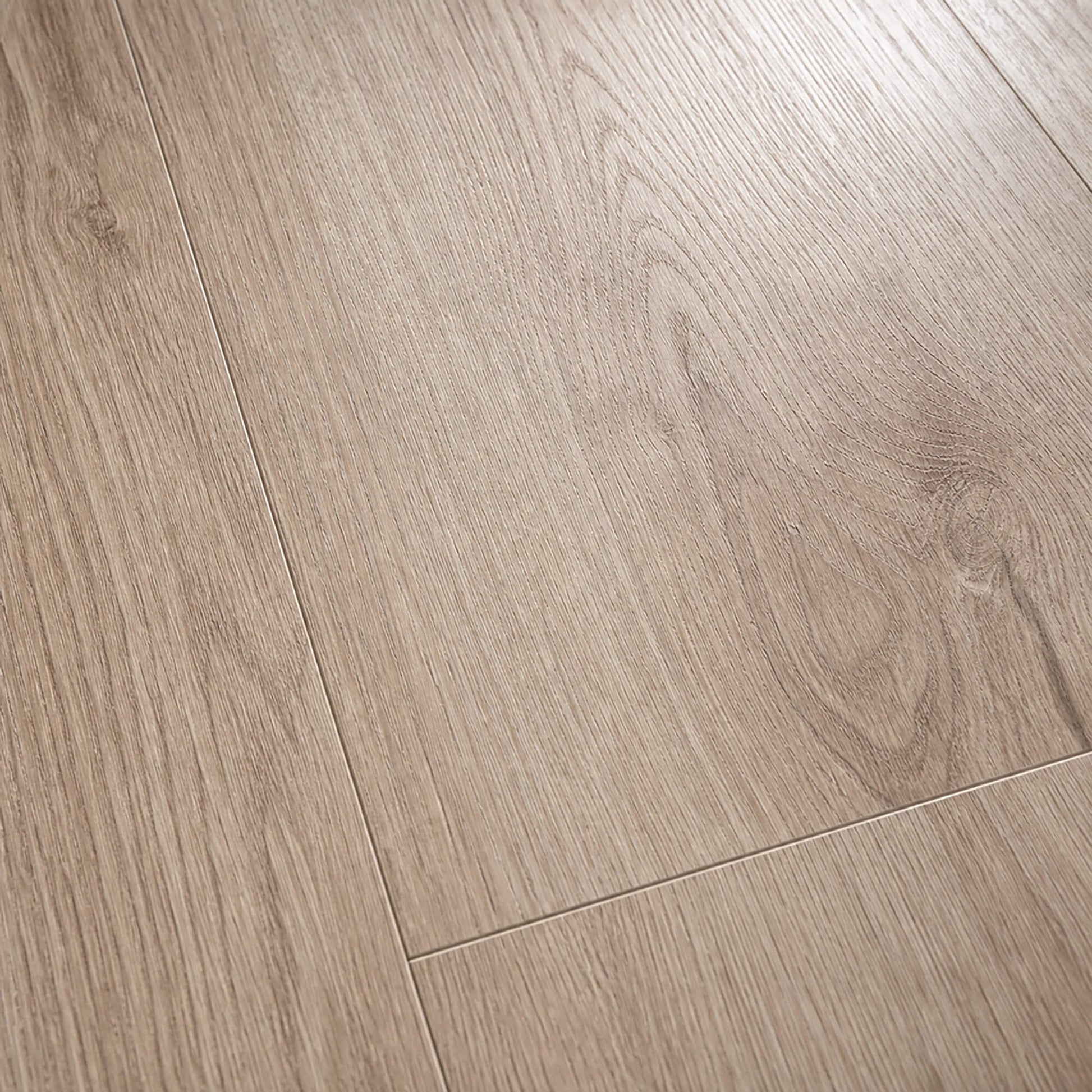 Close-up of the grain and texture of Natural Sterling Oak laminate flooring.