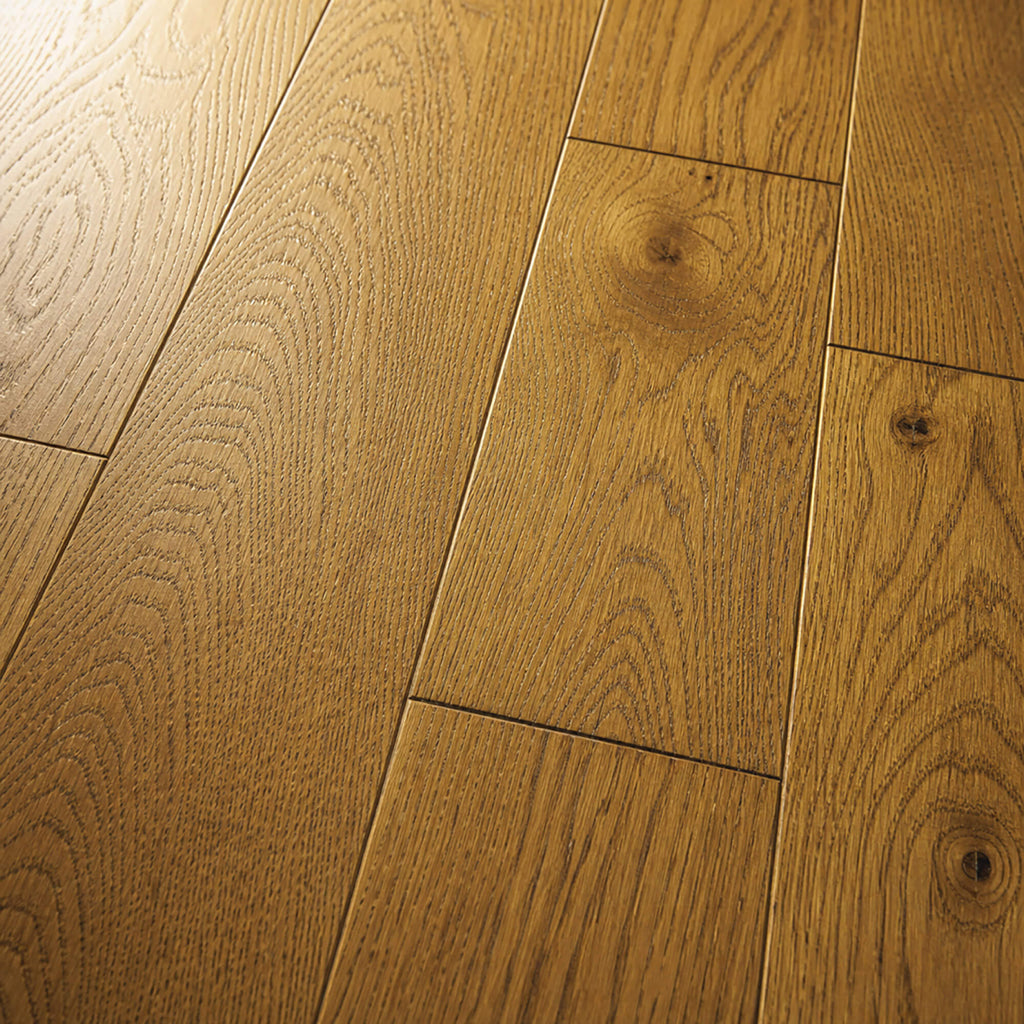 Close-up of Nutmeg Oak UV Oiled 125mm Engineered Wood Flooring with visible grain and texture.