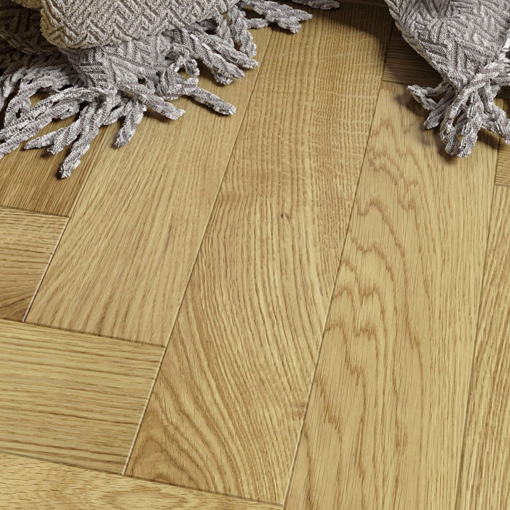 Natural Oak Herringbone Lacquered 90mm Engineered Wood Flooring and textured rug corner.