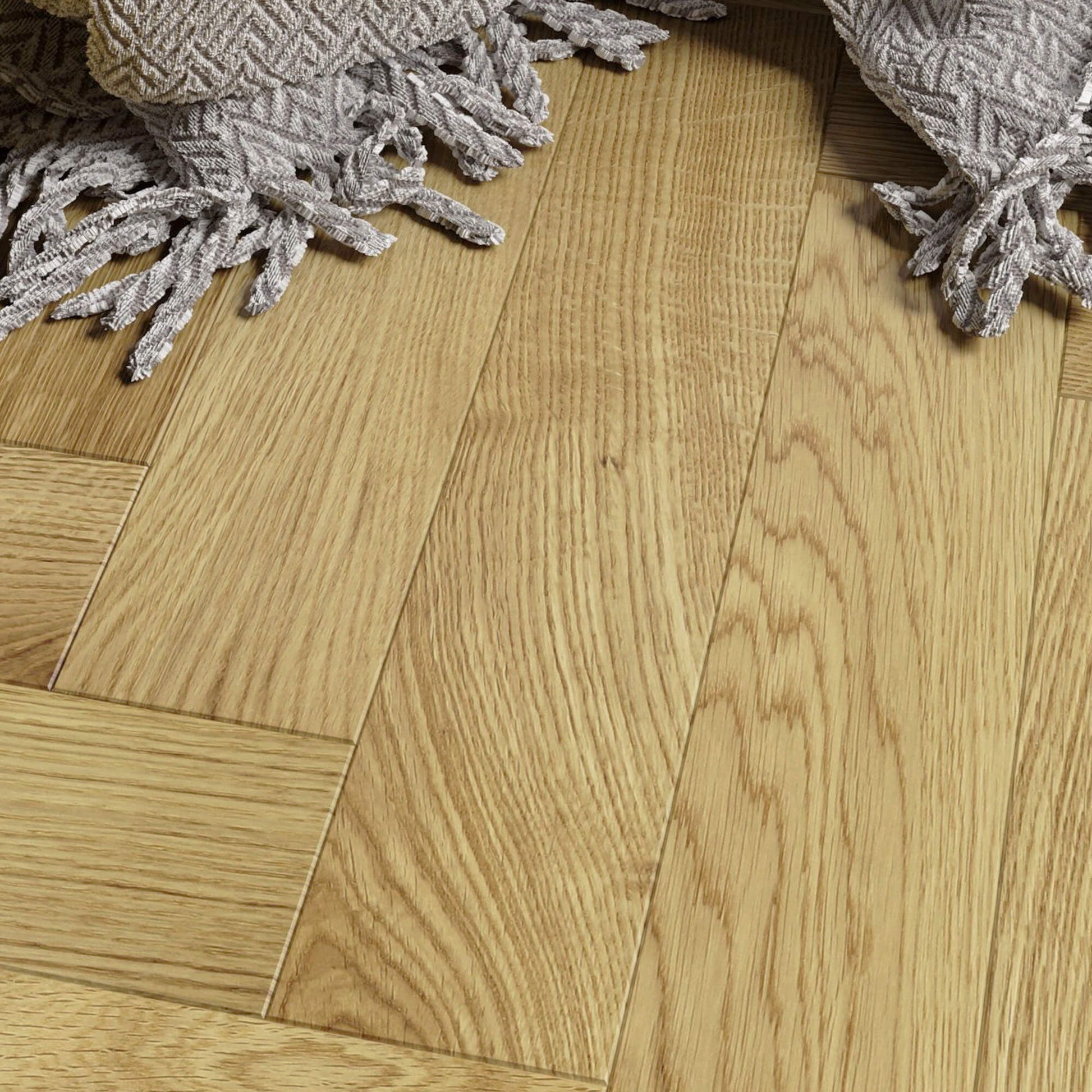Natural Oak Herringbone Lacquered 90mm Engineered Wood Flooring and textured rug corner.