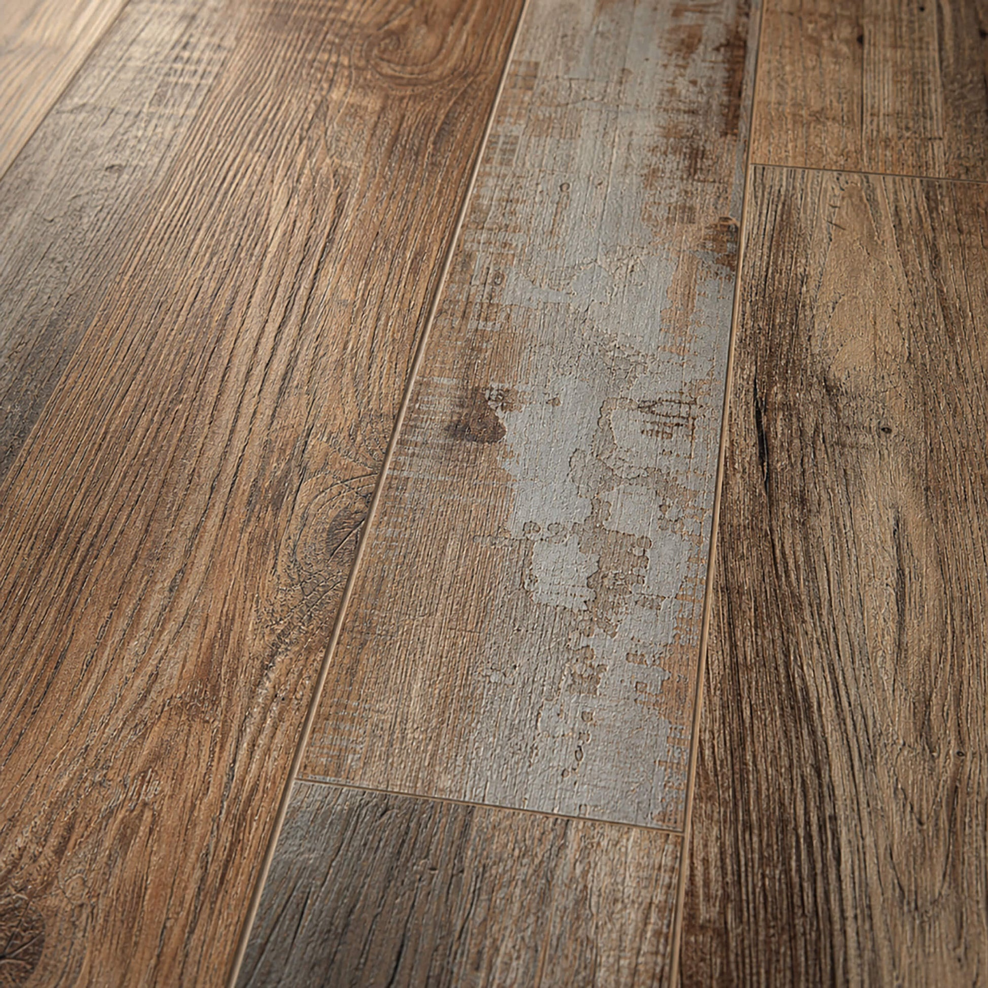 Close-up of the grain and texture of Reclaimed Oak Country laminate flooring.