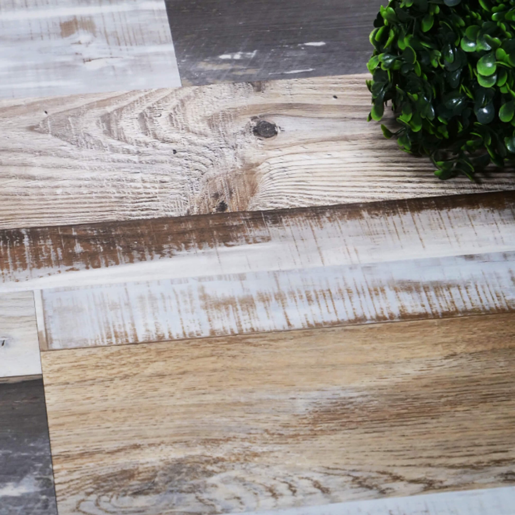 Reclaimed Oak Rigid LVT flooring panels with a rustic finish.