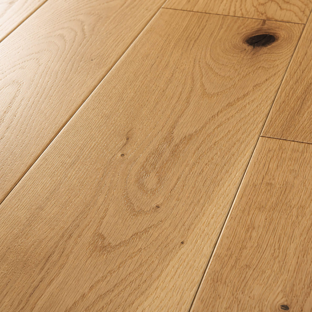 Close-up of Rustic Oak Lacquered 125mm engineered wood flooring with visible grain and texture.