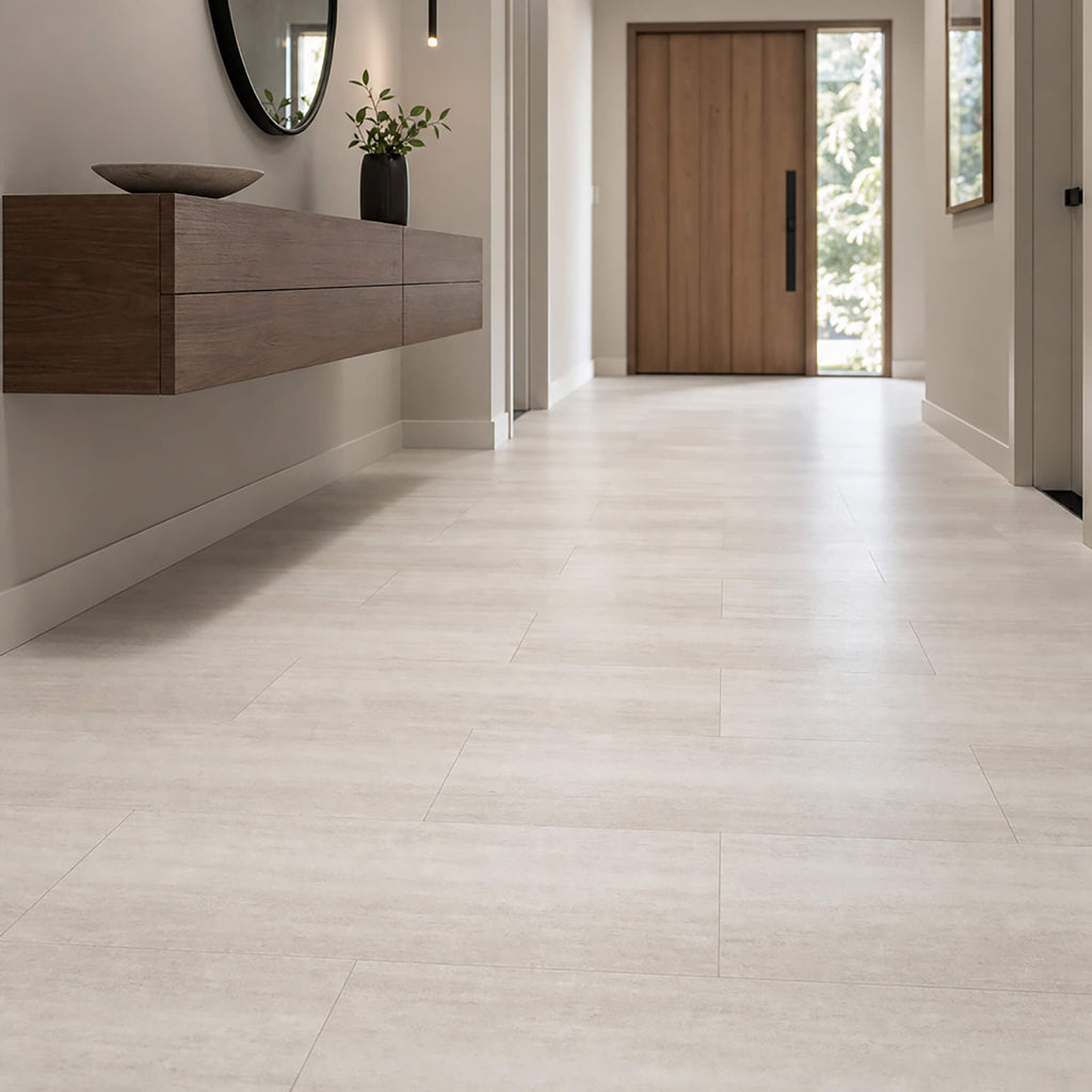 Modern interior with Sandstone Rigid LVT tile flooring, wooden vanity, and large mirror.