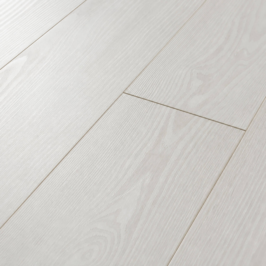 Close-up of Virgin Scandi laminate flooring with a subtle texture.
