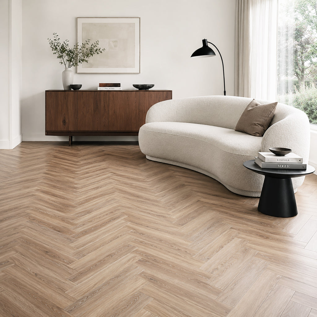 Volcanic Larch Rigid LVT Herringbone flooring in a living room setting.