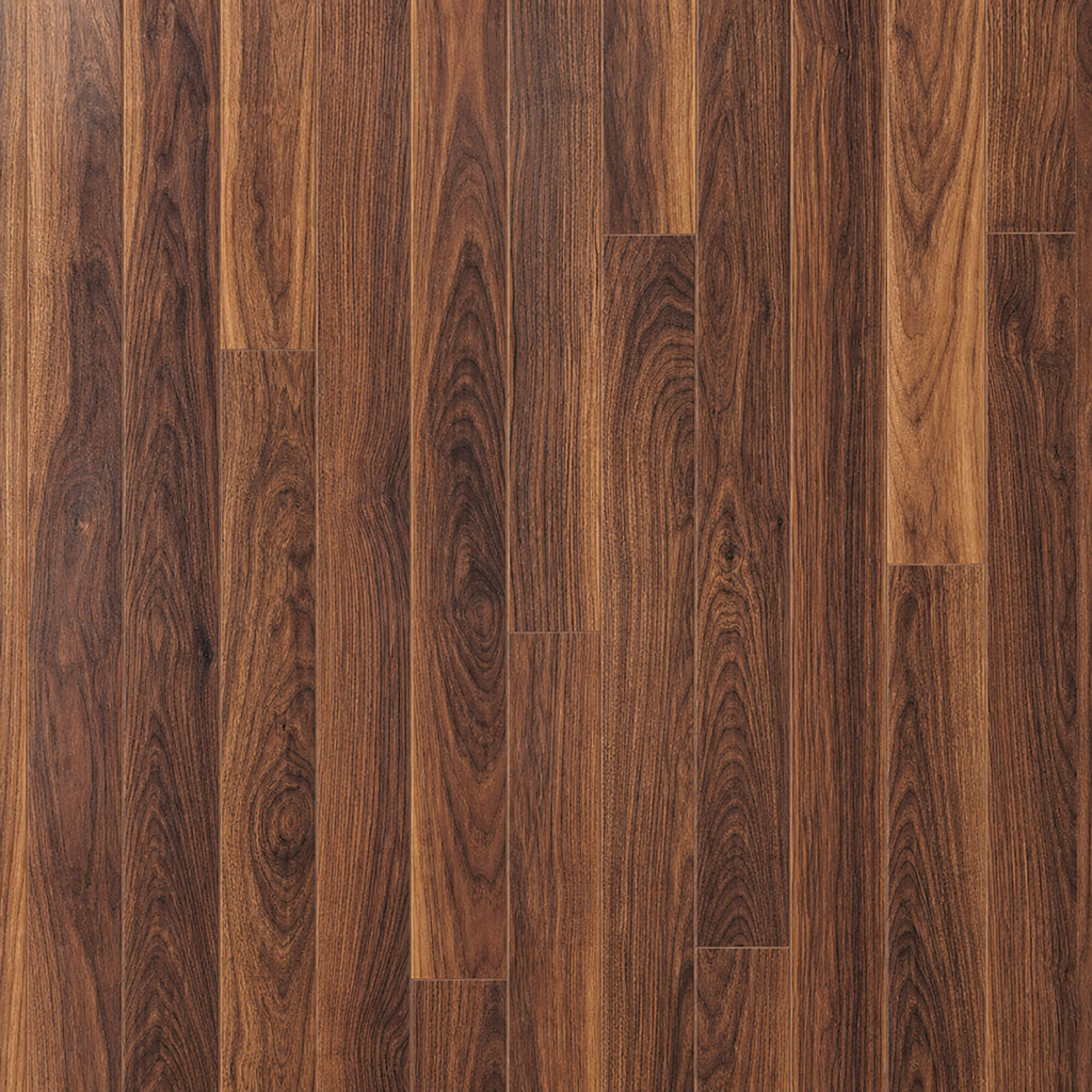Close-up of the visible grain pattern of Walnut prestige laminate flooring.