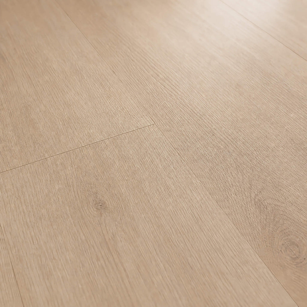 Close-up of the grain and texture of Washed Oak Essentials laminate flooring.