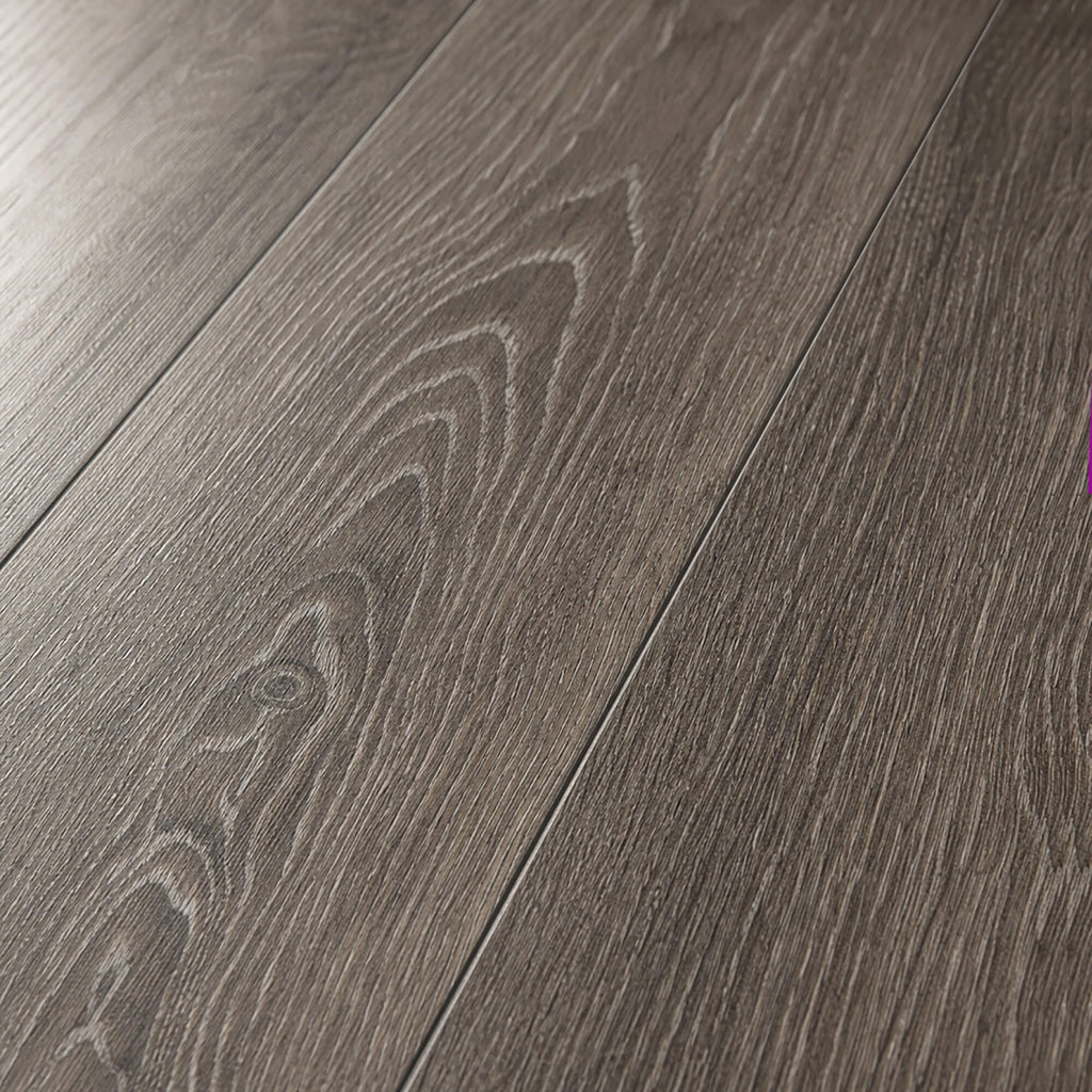 Close-up of Weathered Oak Rigid LVT flooring planks. 