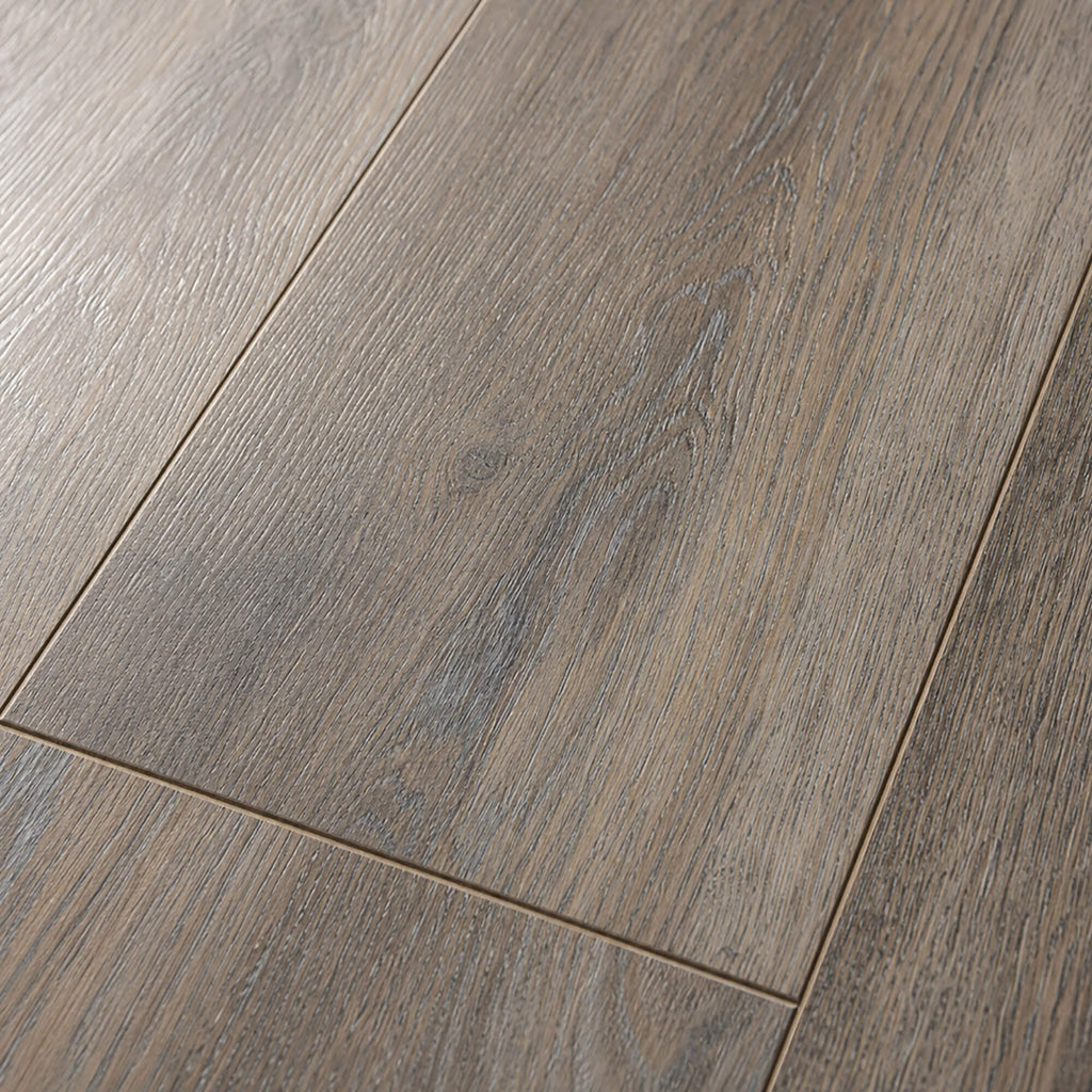 Close-up of the grain and texture of Weathered Oak Prestige laminate flooring.