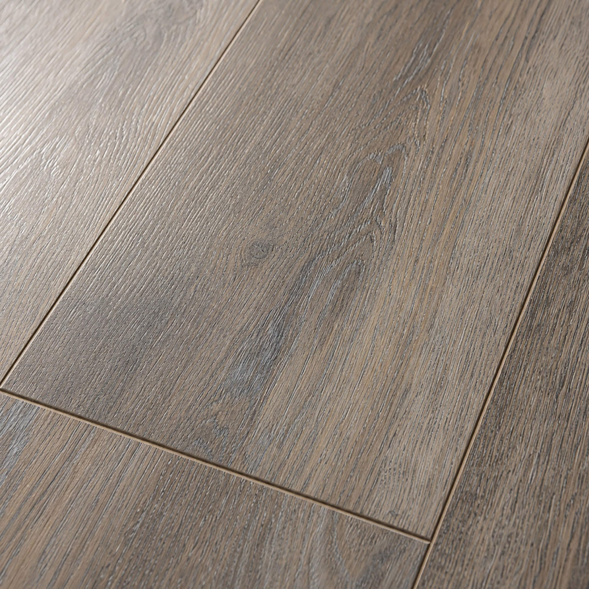 Close-up of the grain and texture of Weathered Oak Prestige laminate flooring.
